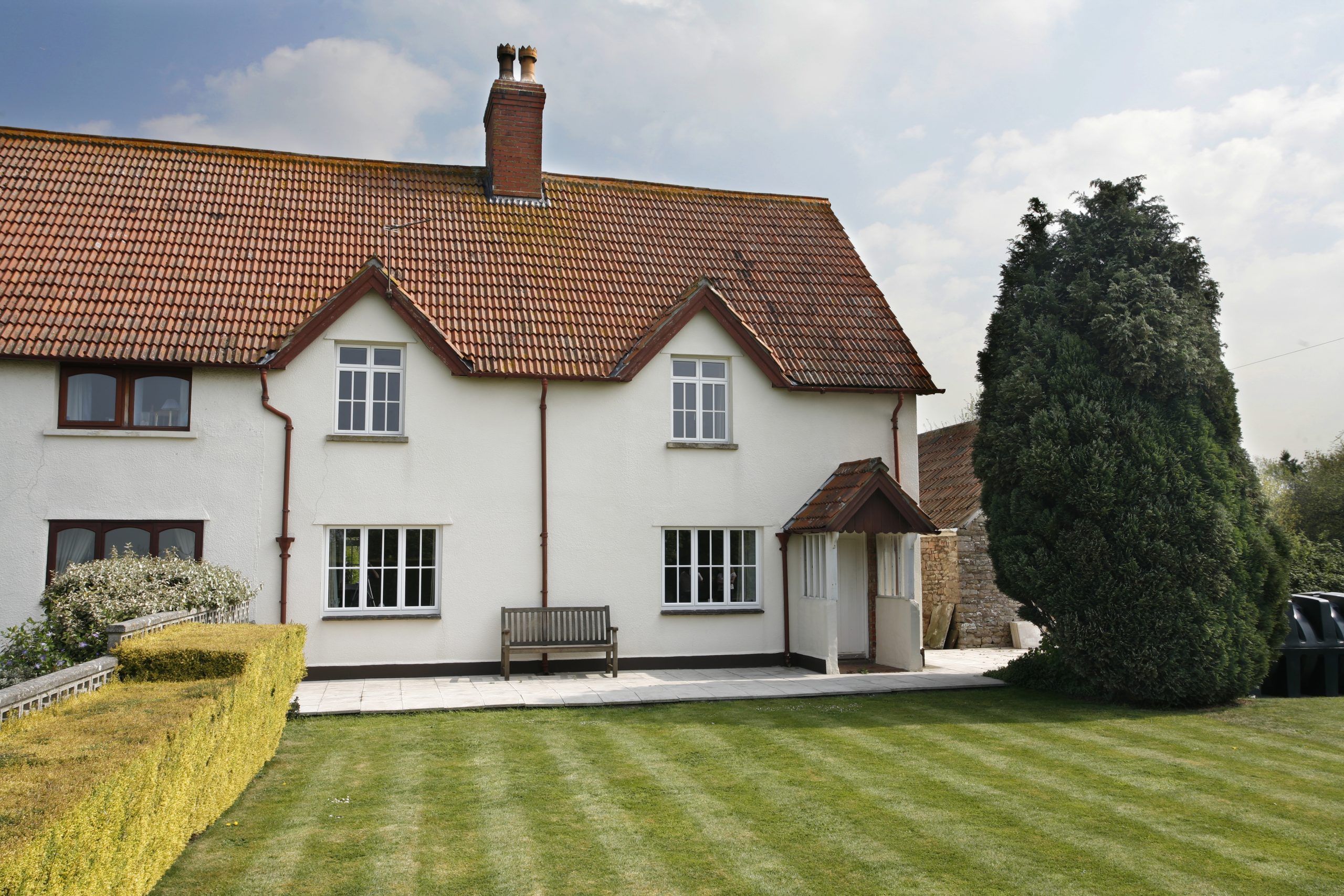 Boy and dog laid on bed